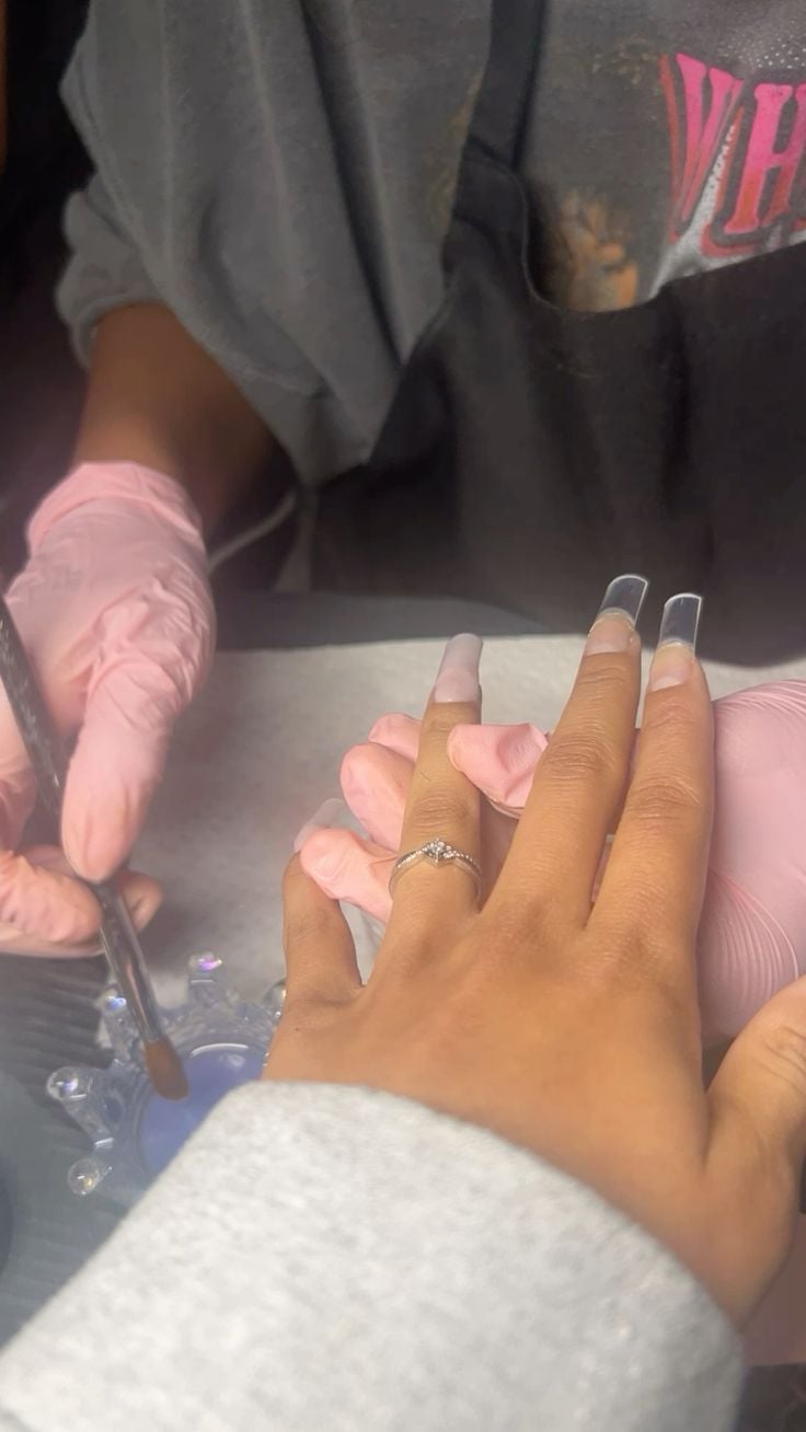 Nail technician handling a difficult client professionally to maintain business reputation and grow the studio