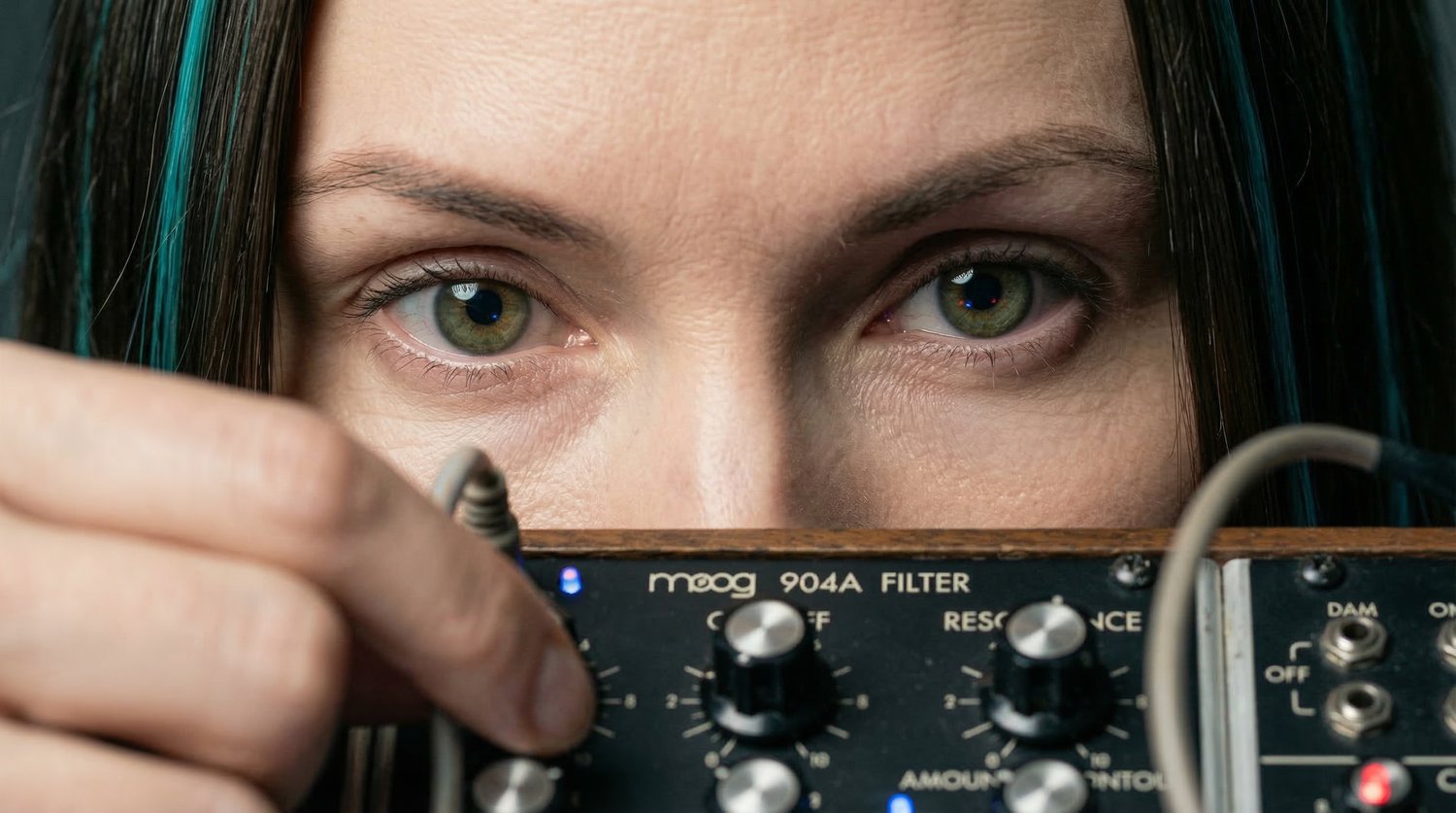 AINO melodic techno project artist portrait used in the AlchemyLoops lab case study.