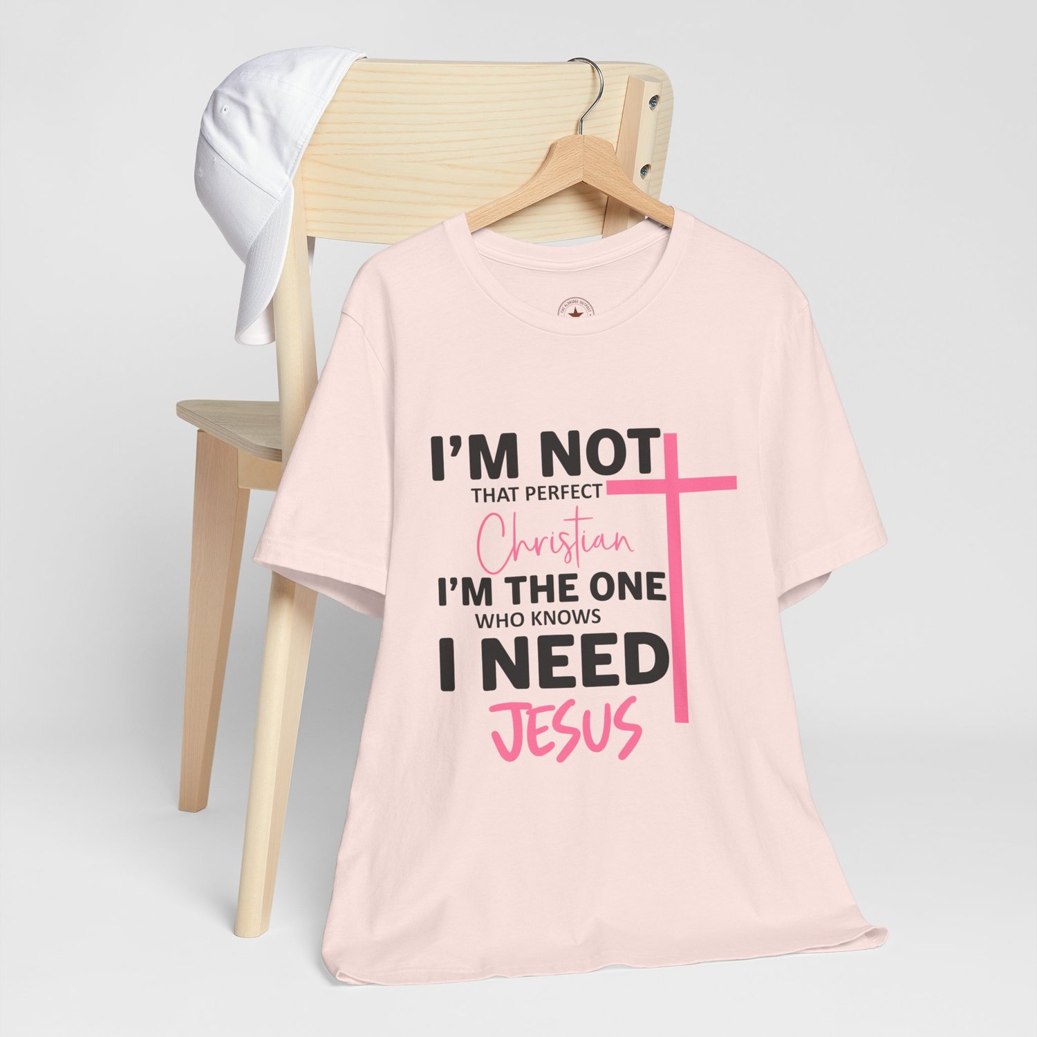 Tone-on-tone Light Pink t-shirt featuring a darker Spring Pink and black faith-based typographic design.