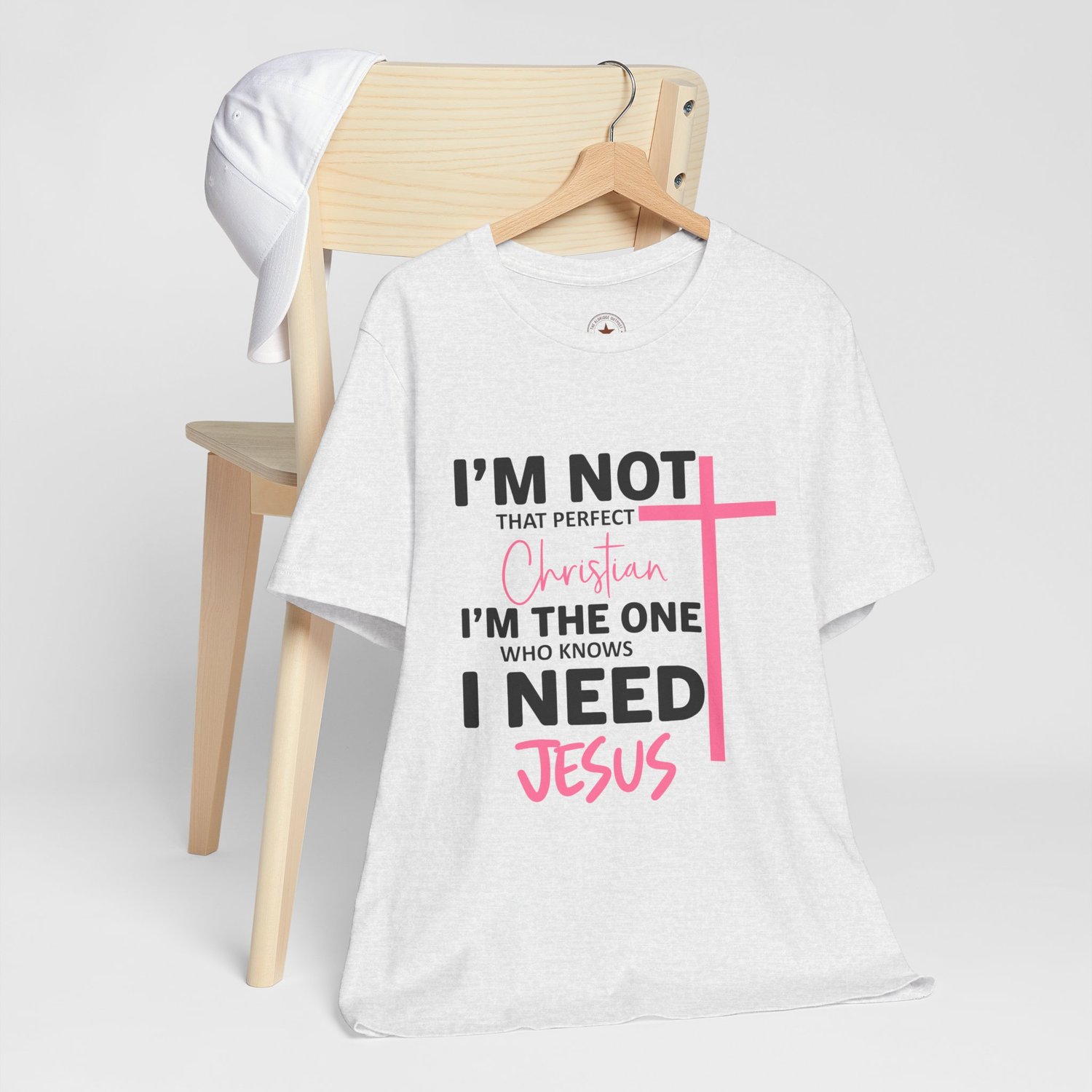 Heather Gray t-shirt with Spring Pink and charcoal text quote Im the one who knows I need Jesus.