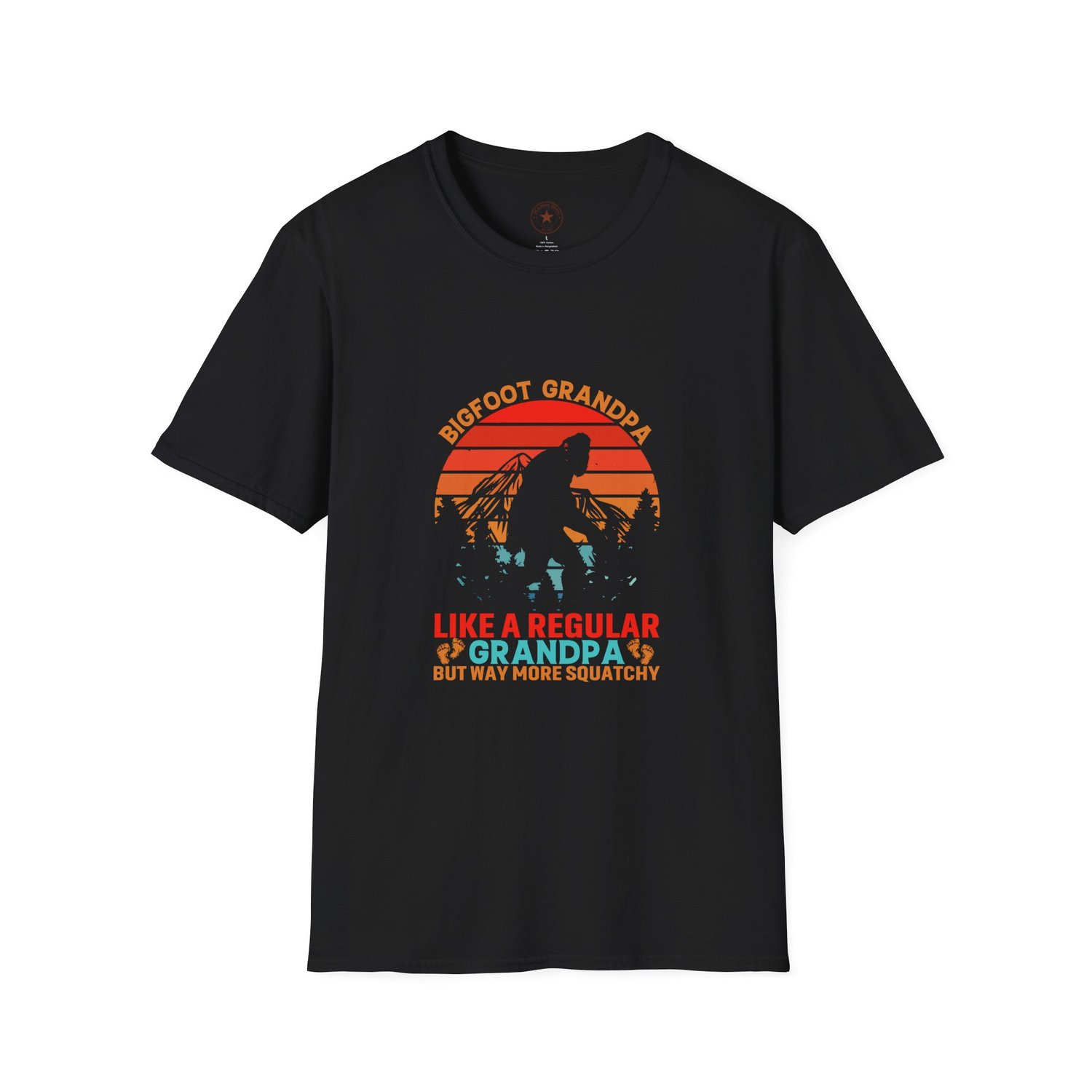 A solid Black unisex t-shirt featuring the Bigfoot Grandpa design. The vibrant retro sunset colors pop boldly against the dark fabric.