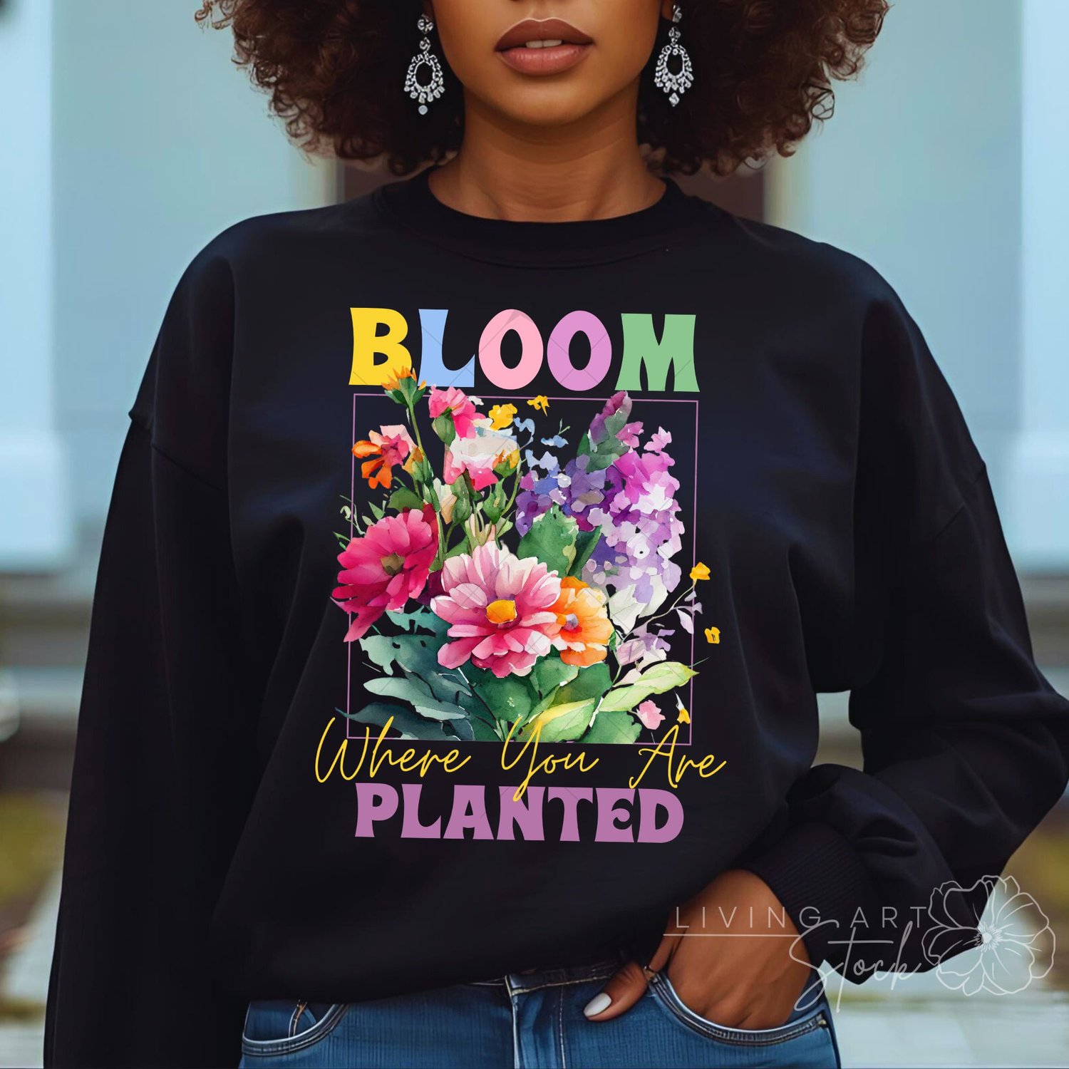 Colorful watercolor spring art design with "Bloom Where You Are Planted" quote centered with Spring watercolor flowers on black tshirt