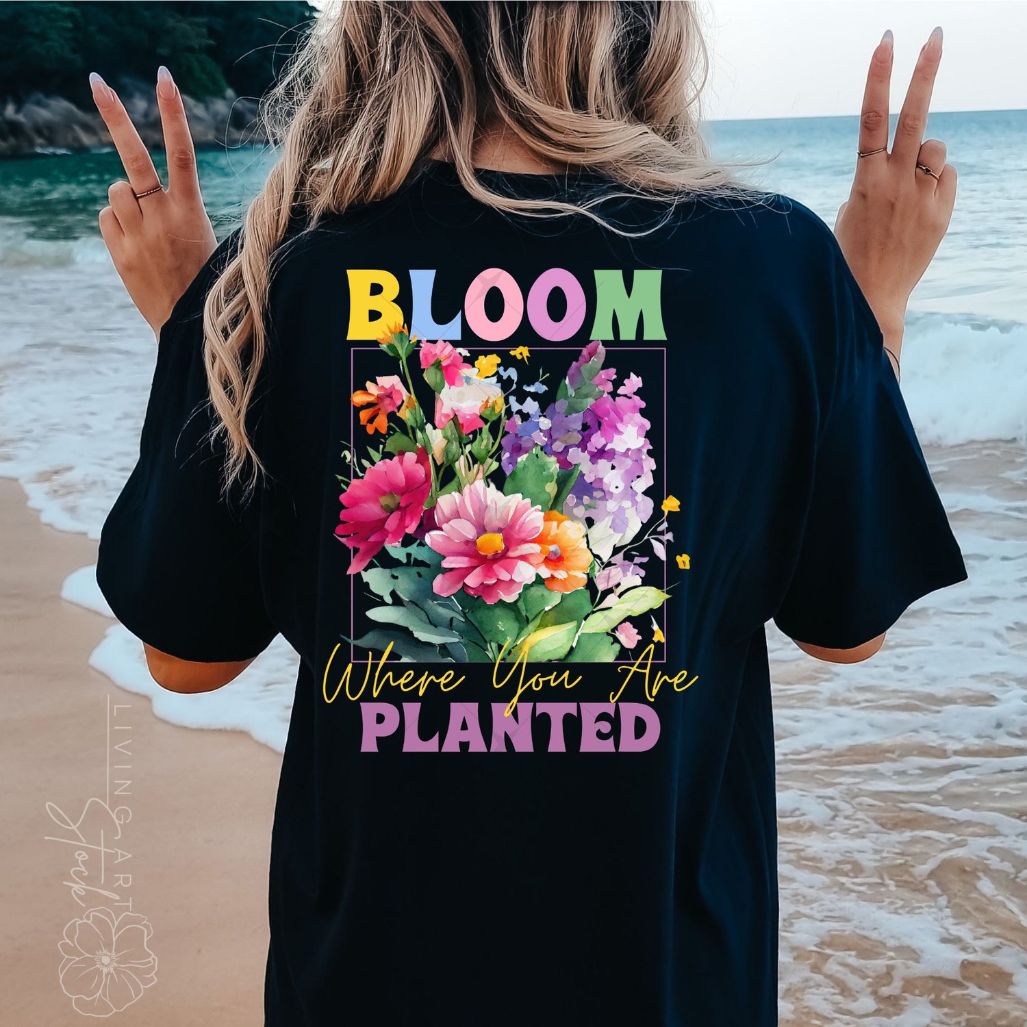 Colorful watercolor spring art design with "Bloom Where You Are Planted" quote centered with Spring watercolor flowers on black tshirt