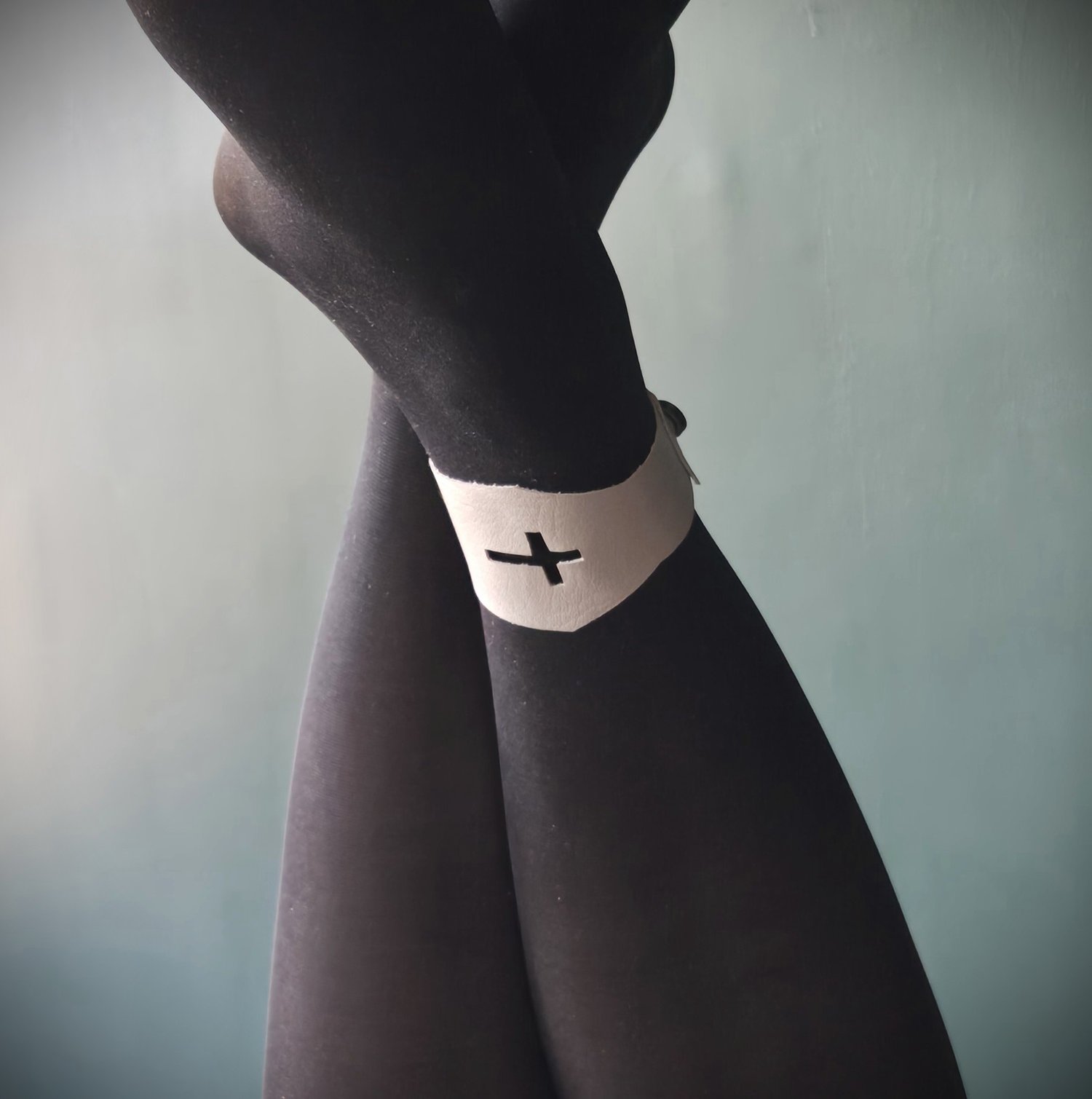 coffin anklet on nylon clad legs