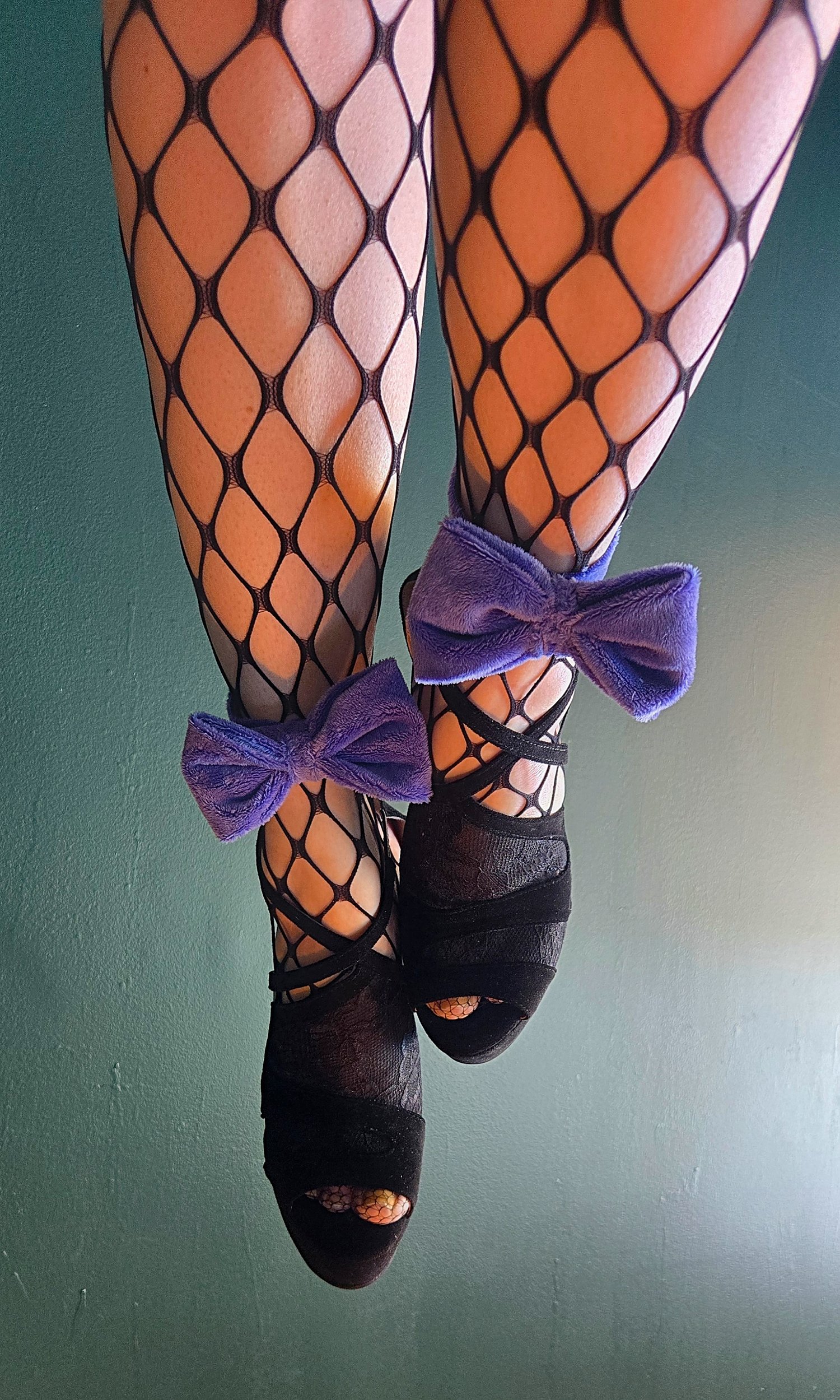 fishnet stockings, velvet bow anklets, stilettos