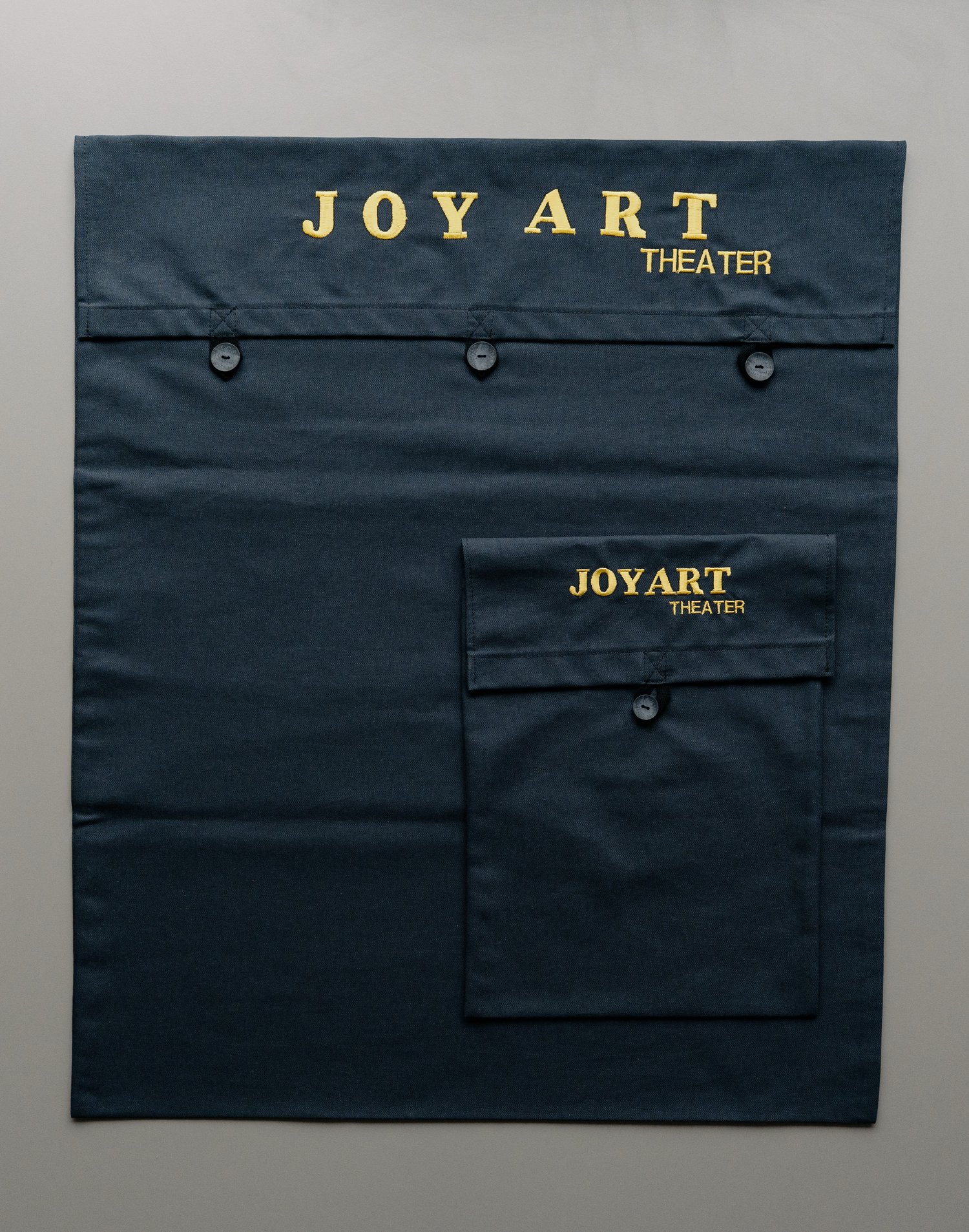 Two handmade JoyArt storage cover pouches large and small — PDF sewing pattern for doorway puppet theatre by MUNA Patterns