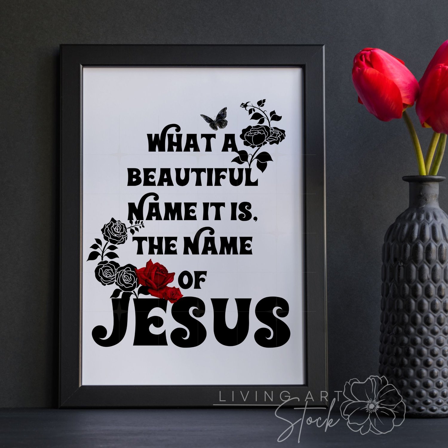 Black stylized text quote "What a Beautiful Name It Is, The Name of Jesus" on a white background, featuring red and black rose illustrations and a black butterfly.