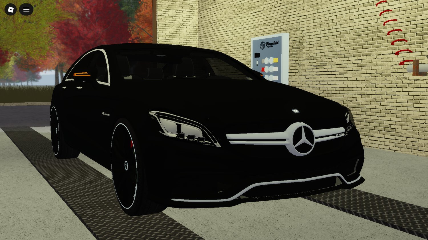 Detailed AMG sedan parked in urban roadway setting