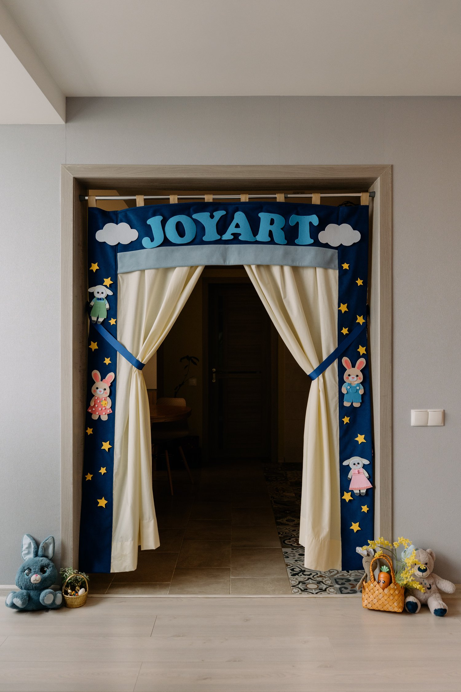 JoyArt Doorway Theatre fully assembled with star and floral decorations – handmade puppet theatre PDF sewing pattern for kids