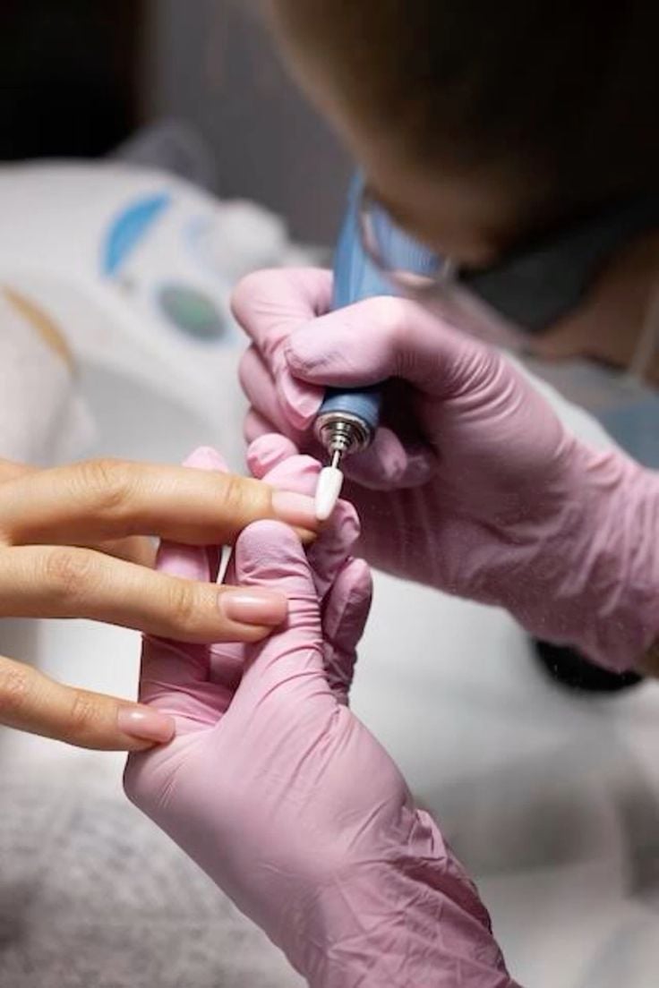 Nail studio promotion combining referral programs, upsells, and seasonal offers for client engagement.