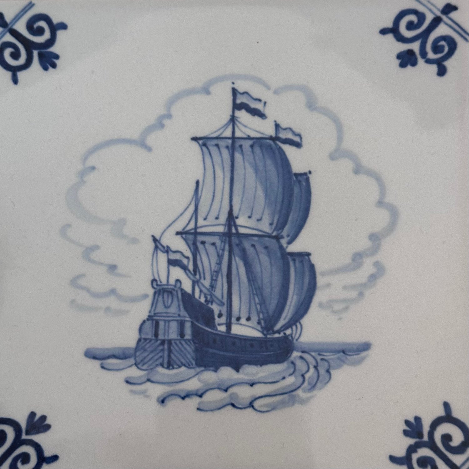 Delft tile pained with 3 masted ship.