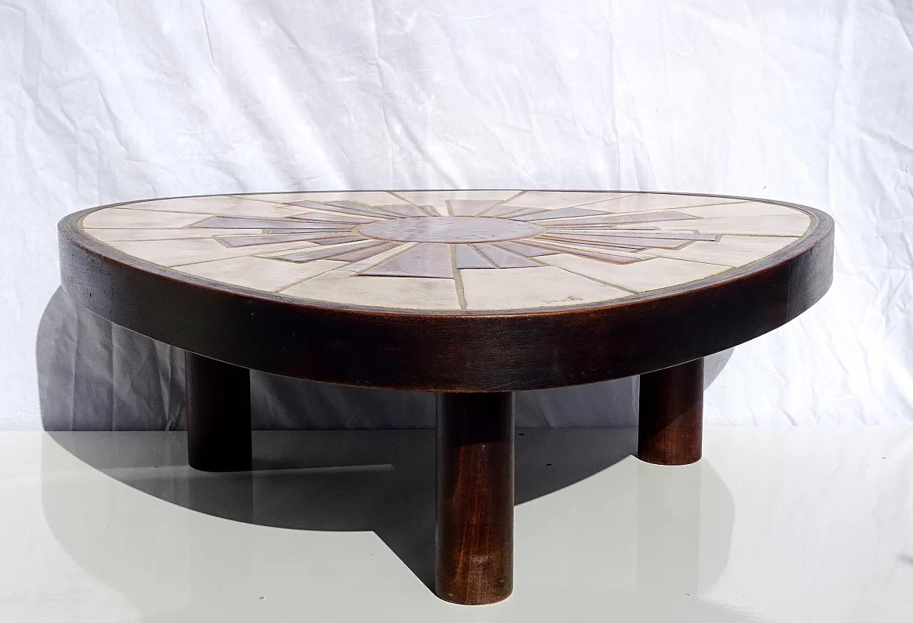 triangular table with handcrafted ceramic top in a radiant sunburst mosaic of amber, rust, and beige tiles, signed by artisan Barrois