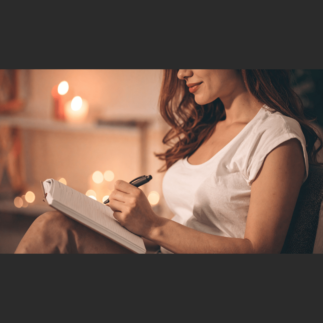 Business tools including. a lady writing in a notepad for business growth coaching and SEO strategy - Rachel Borscz