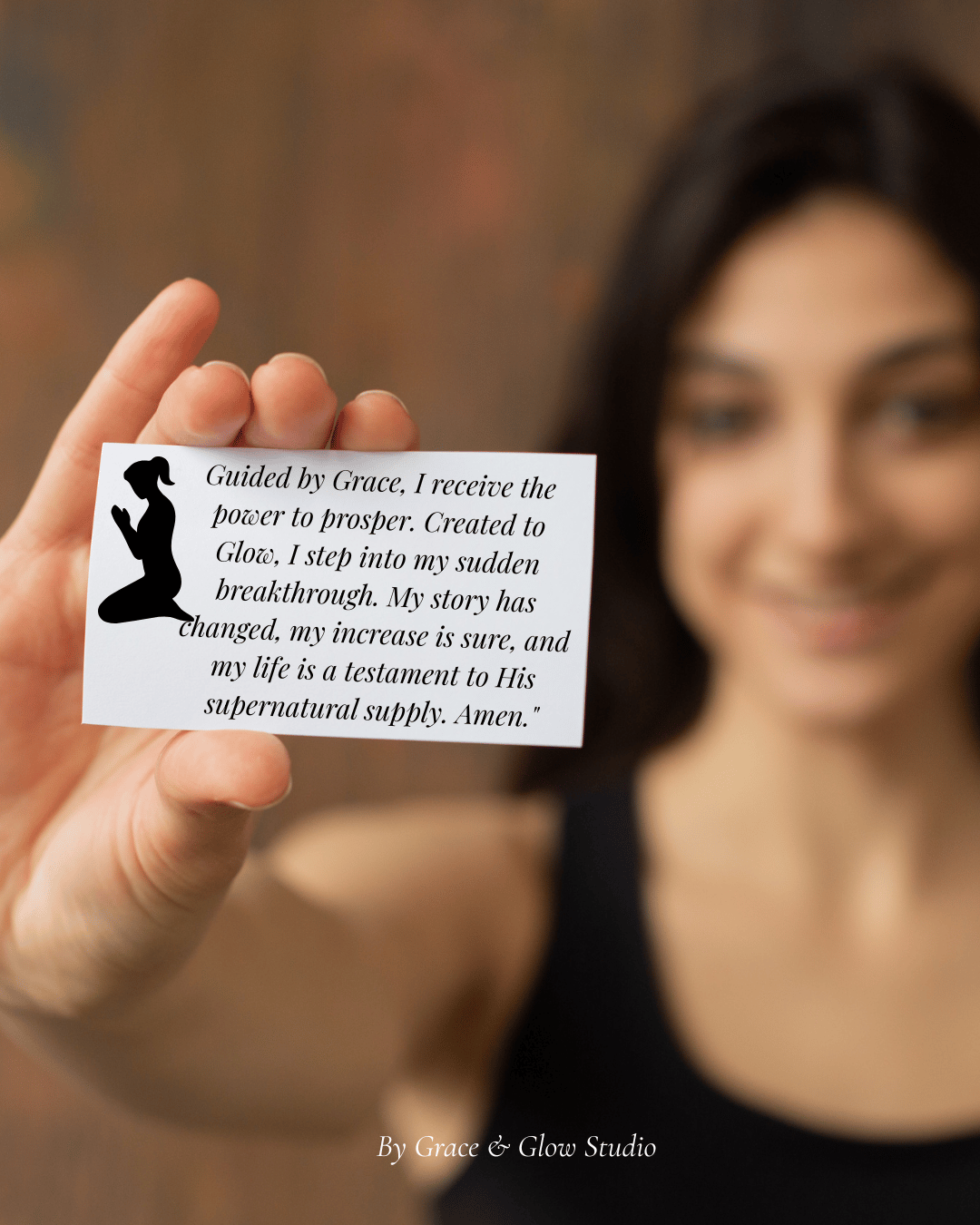 Prayer and affirmation card collection cover showing a hand holding a Christian affirmation card with a soft, blurred background.
