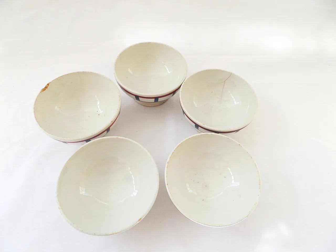 Set of five French footed café au lait bowls Basque pattern of red and blue stripes by Badonviller