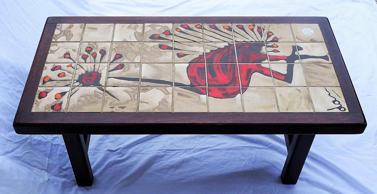 1960s coffee table featuring a hand-painted Gray Crowned Crane motif, signed ‘Dan’