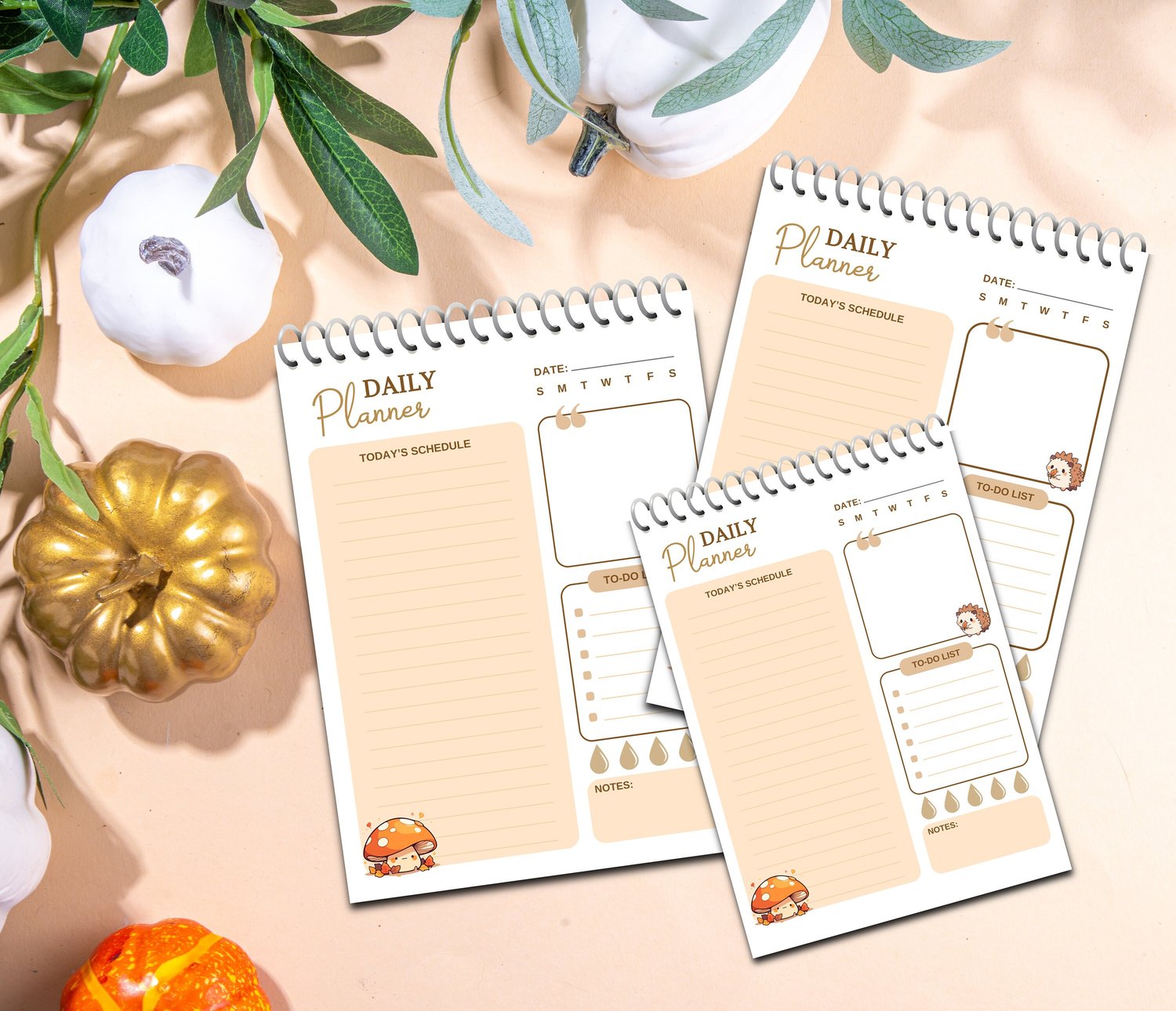 Set of three fall‑themed daily planners in A4, A5, and US Letter sizes, surrounded by decorative pumpkins and leaves, with sections for date, schedule, to‑do list, and notes.