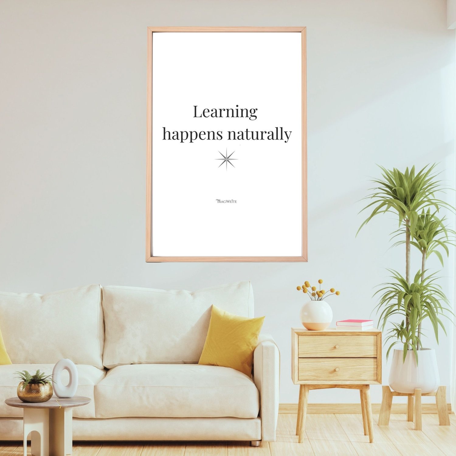 Framed printable poster "Learning happens naturally" in black and white, displayed in a cozy living room. Minimalist wall art by Tragweite for unschooling families. Gerahmtes Poster „Lernen geschieht natürlich" in Schwarz-Weiß im Wohnzimmer. Minimalistisc