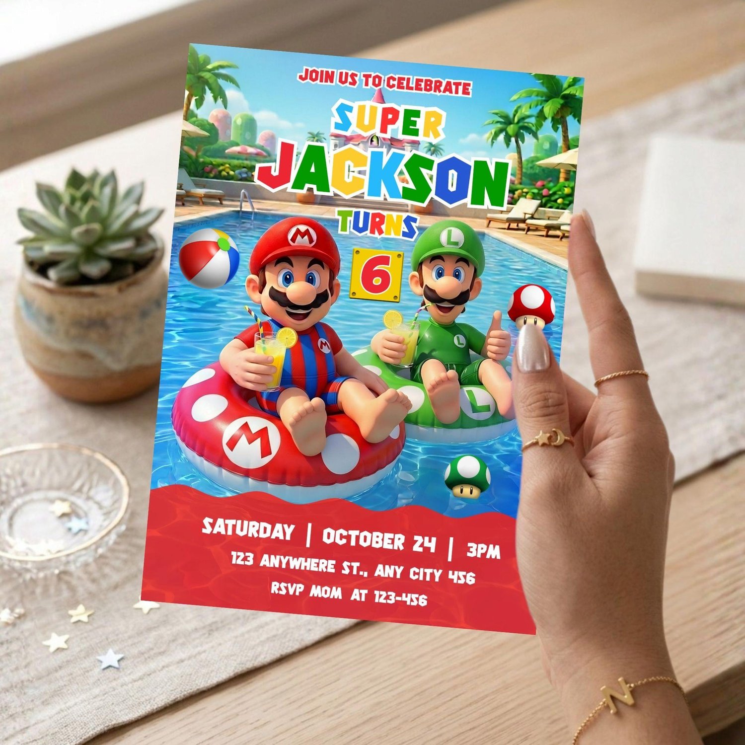 A flat-lay view showing the crisp, high-resolution printable layout of the Super Mario summer birthday invite for a kids pool party bash.