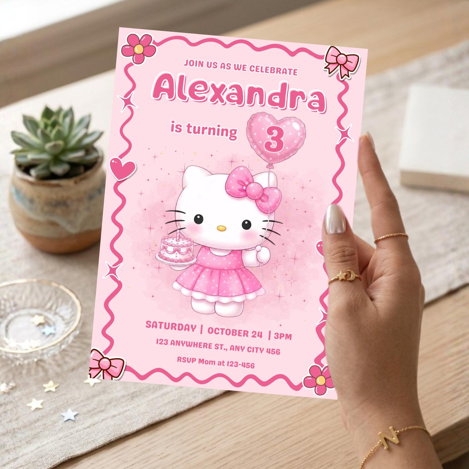 Cute Hello Kitty birthday party invitation editable in Canva for girl birthday celebration