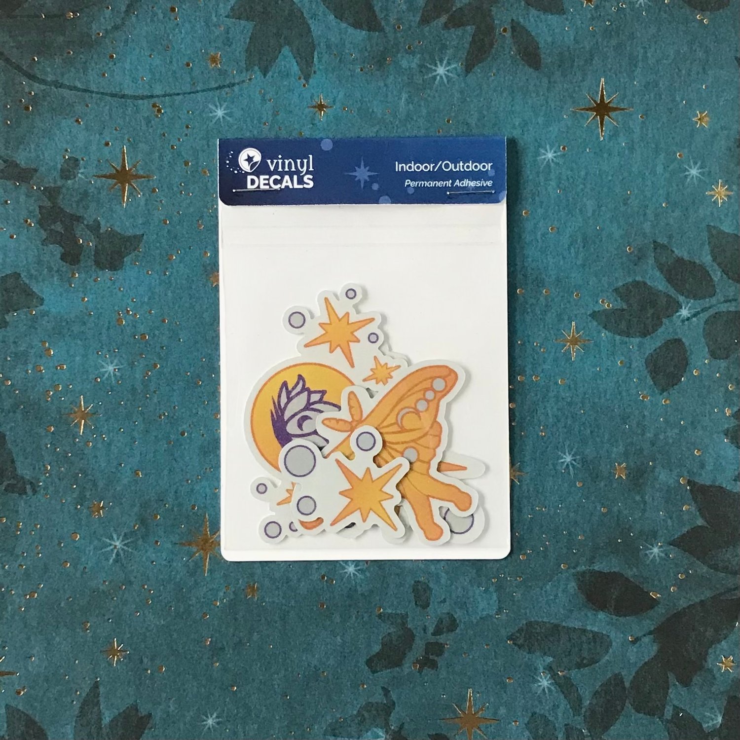 Four lunar-themed decals in their packaging.