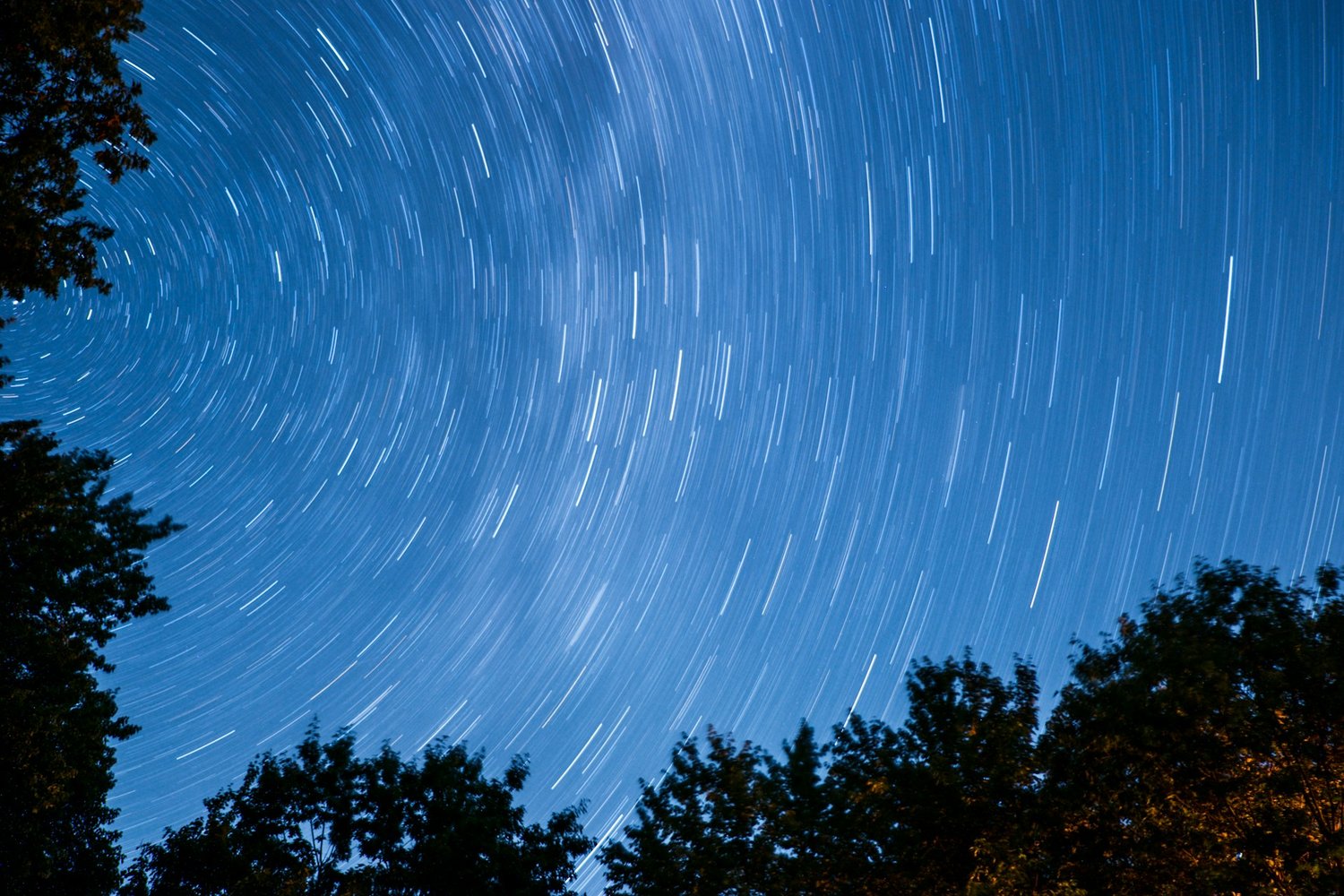 A photo of Moving stars above Fryeburg by Jeff Golenski via Unsplash