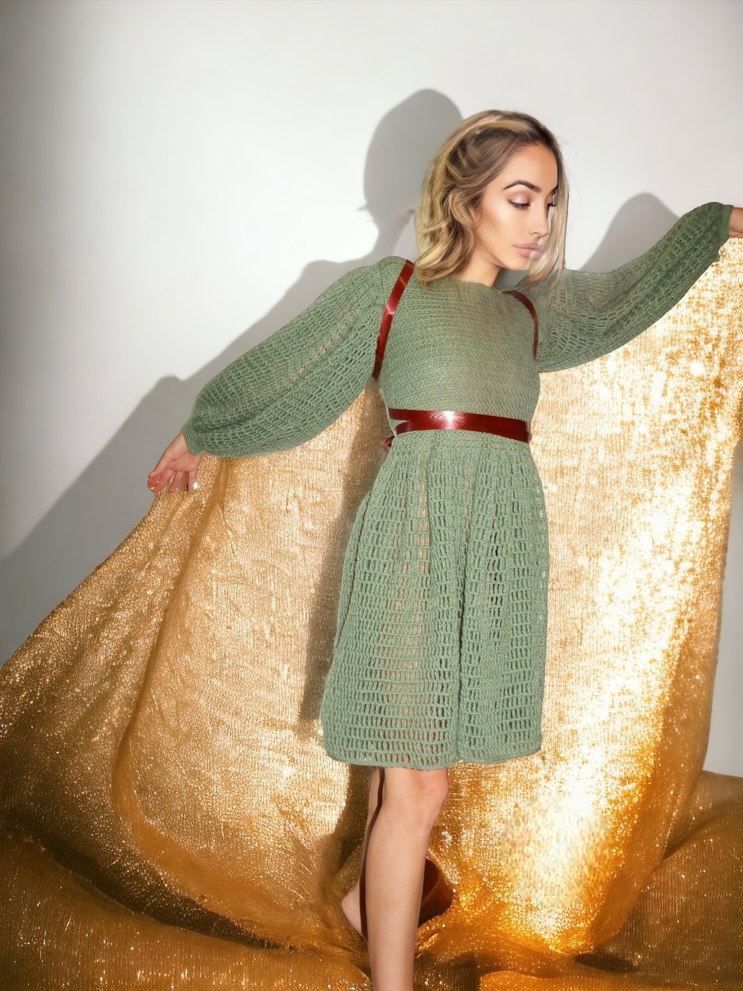 Welcome the newest addition to the Tina's handicraft collection: a stunning, handmade knitted dress in a beautiful shade of sage green. This unique piece is crafted with love and attention to detail, using high-quality cotton yarn that offers comfort and 