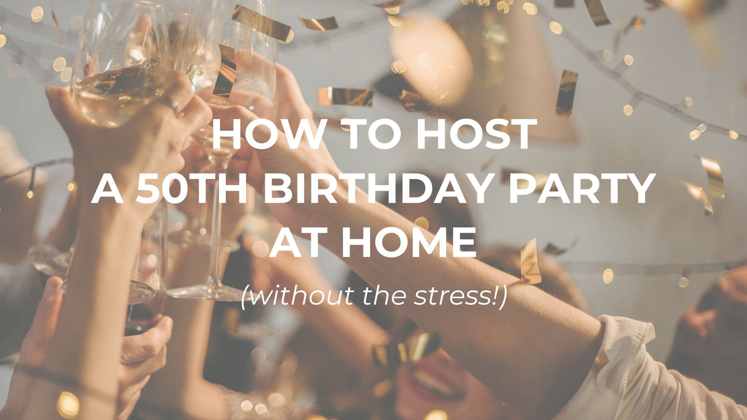 A joyful group of friends raising wine glasses in a toast at a home celebration with fairy lights and falling gold confetti, with text overlay: How to Host a 50th Birthday Party at Home (Without the Stress!).