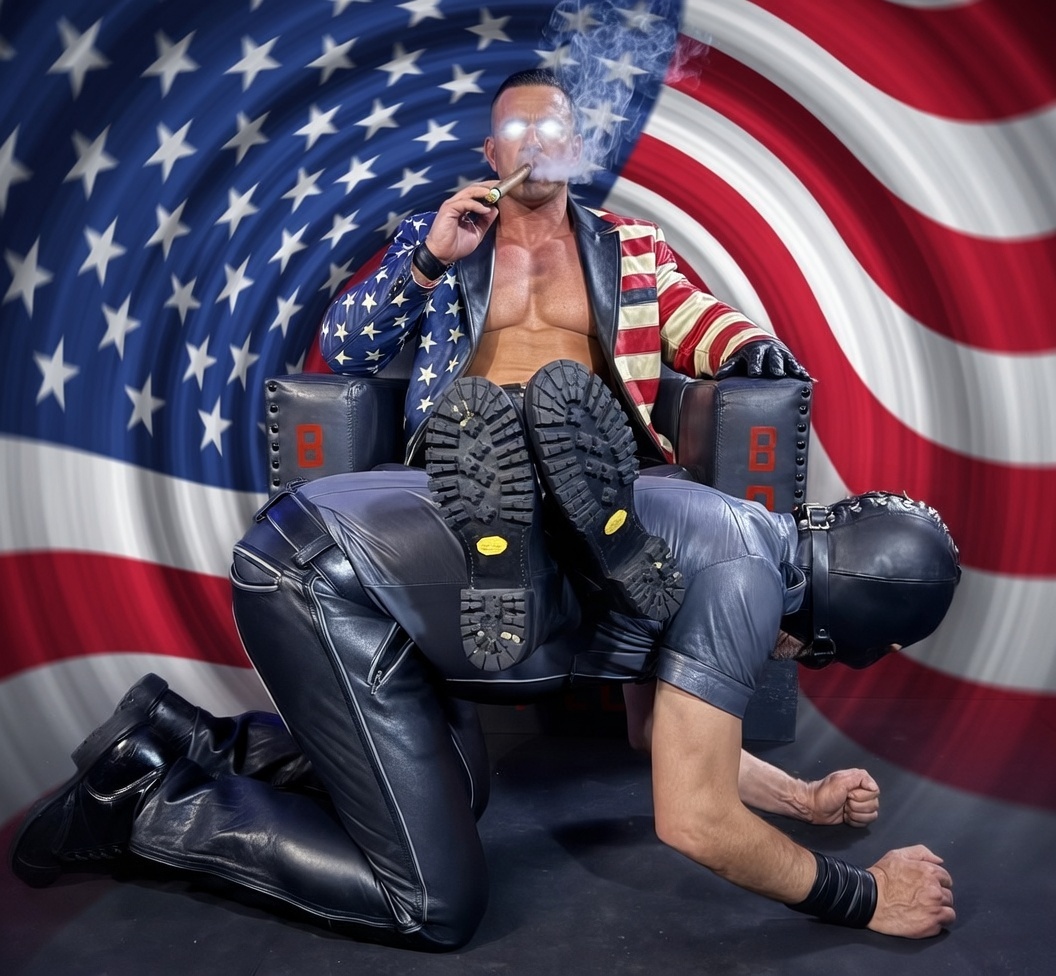 Hey handsome American with a spiral flag background wearing a leather blazer and using another man of the footstool as he smokes my head