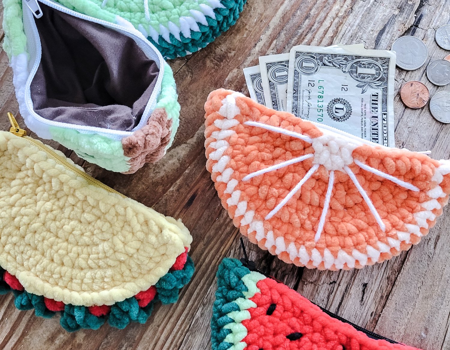 Cover image for the free Cuddly Coin Purse crochet pattern featuring three soft chenille yarn coin purses shaped like an orange slice, watermelon slice, and taco. These plush crochet pouches showcase the playful food-inspired designs included in the patte