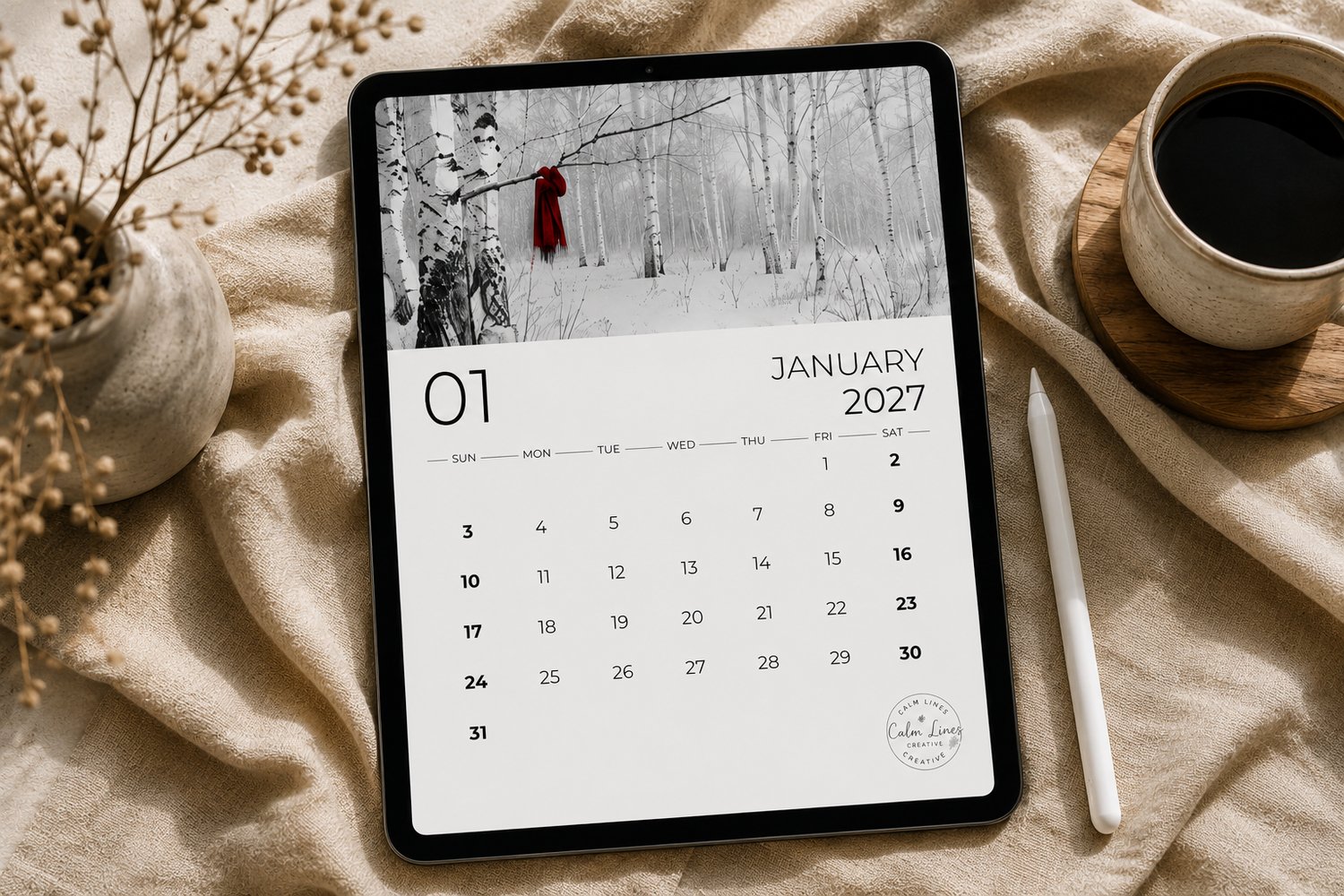 Digital preview of the printable black and white 2027 photography calendar displayed on a tablet.
