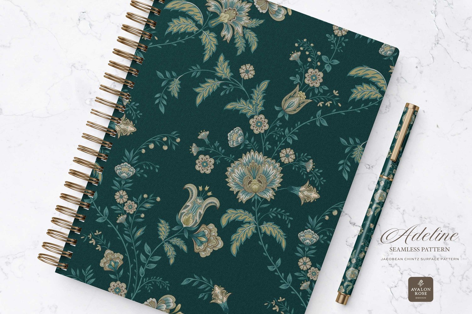 Hand drawn seamless surface pattern featuring intricate, stylized florals and climbing vines in teal blue and greens on a notebook