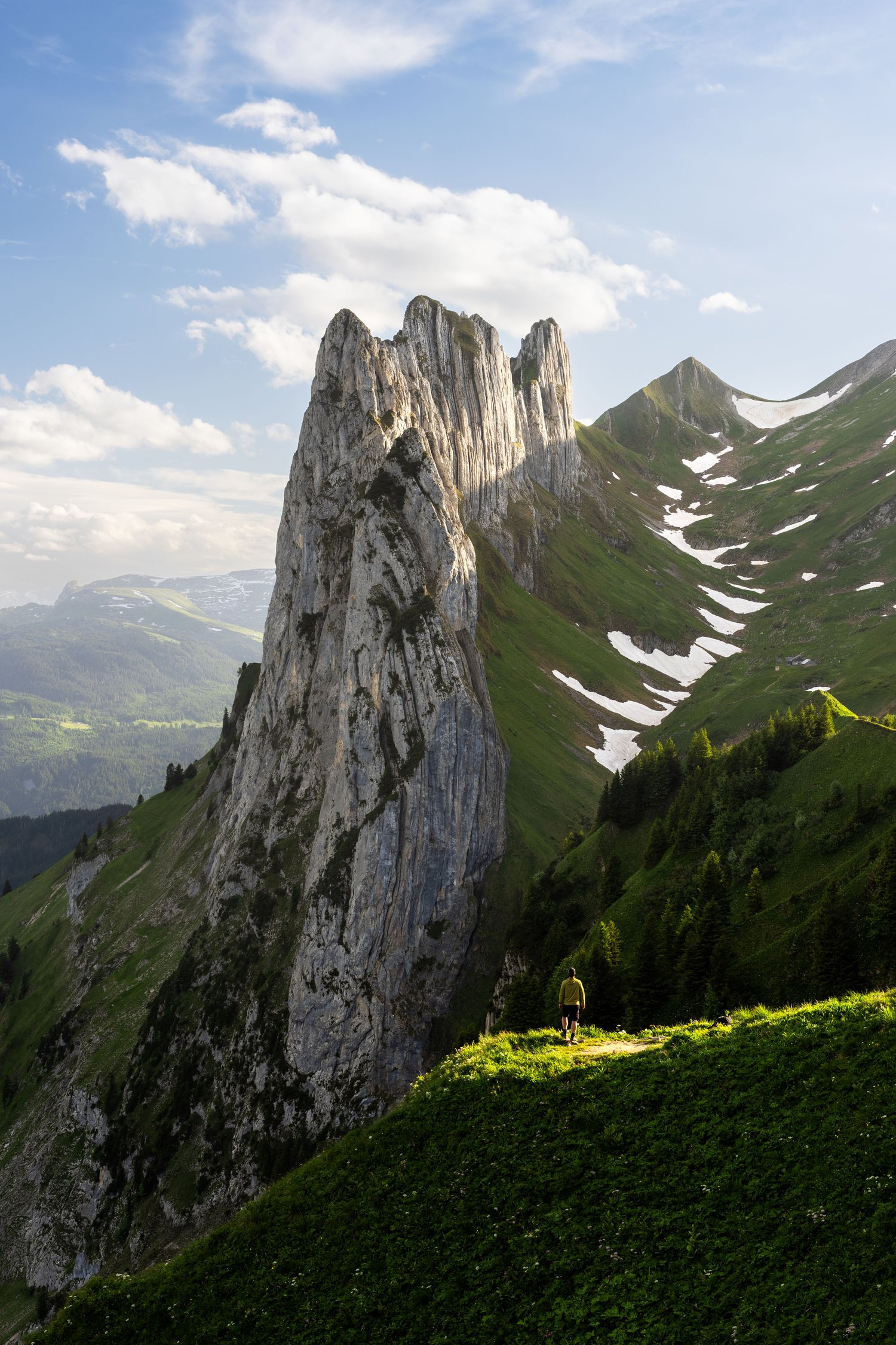 Switzerland Saxer Lücke cliffs mountains landscape photography dappled light 4 person long lens_1