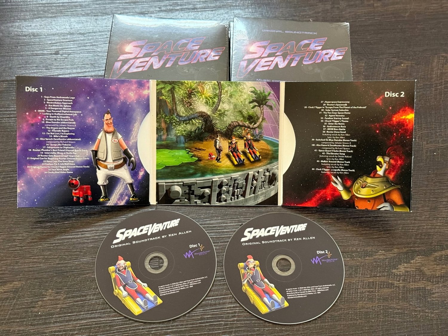 SpaceVenture dual CD sleve and CD with art from the game and listings of each CD's content.