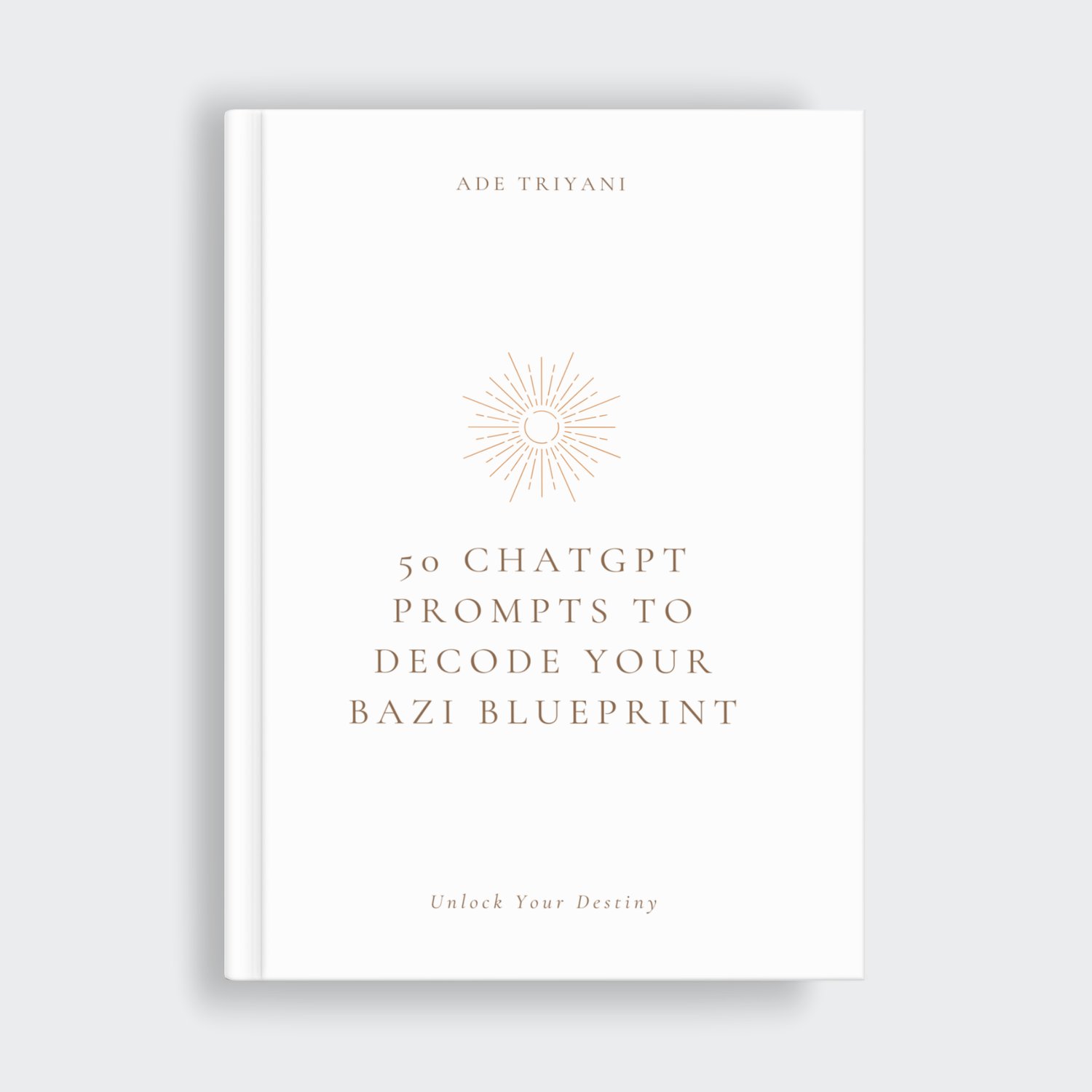 Hardcover book mockup titled '50 ChatGPT Prompts to Decode Your BaZi Blueprint: Unlock Your Destiny' by Ade Triyani, featuring a minimalist white cover with a gold sunburst icon.