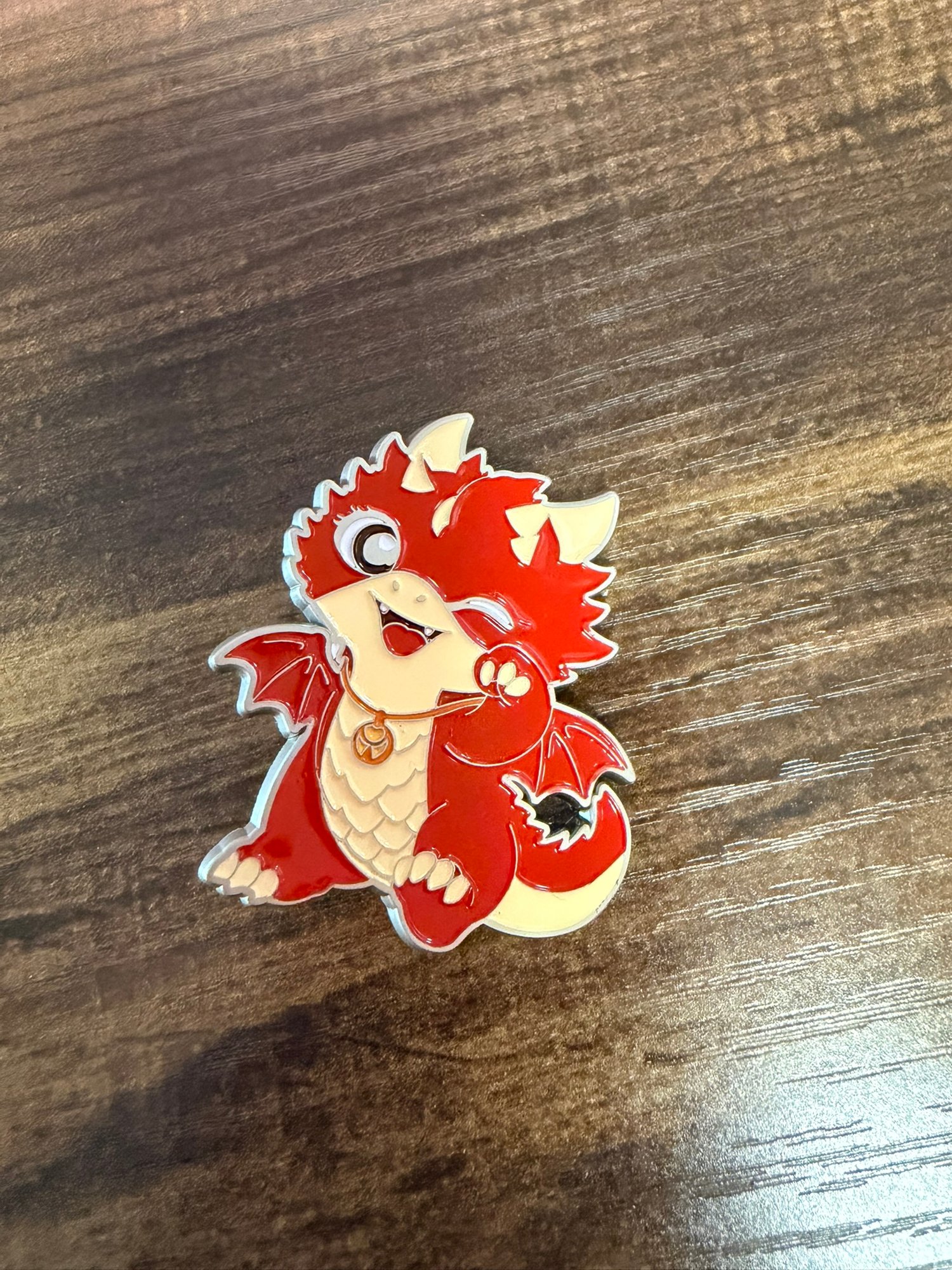 Cinder the baby dragon pin
