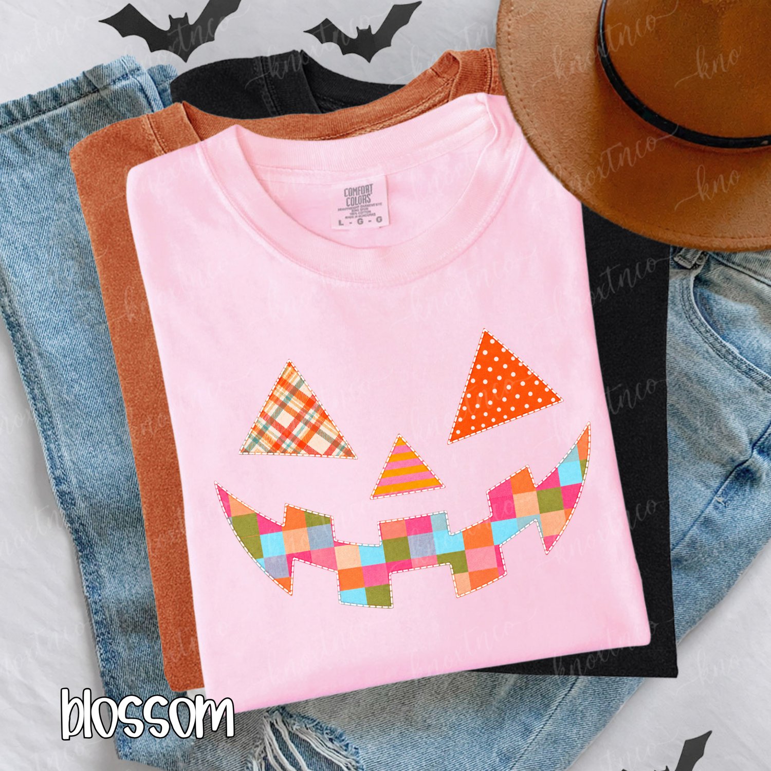 A soft Comfort Colors® tee featuring a colorful quilt-look jack-o’-lantern with playful patchwork patterns and faux stitched details. A cheerful choice for Halloween parties, pumpkin-patch trips, fall festivals, and everyday autumn outfits.