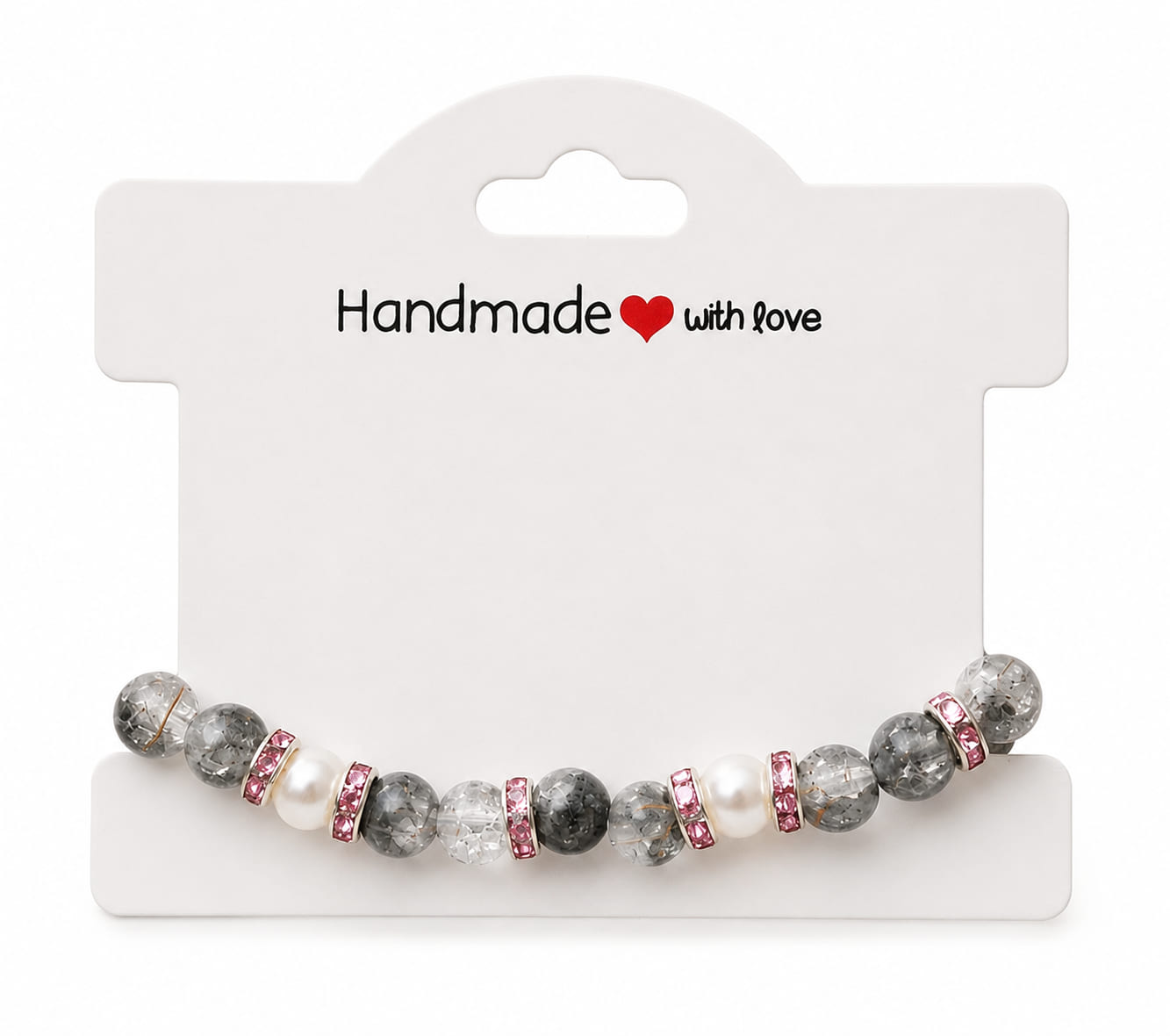 Pink rhinestone, smoky crackle glass and resin pearl bracelet presented on a Handmade with love jewellery display card