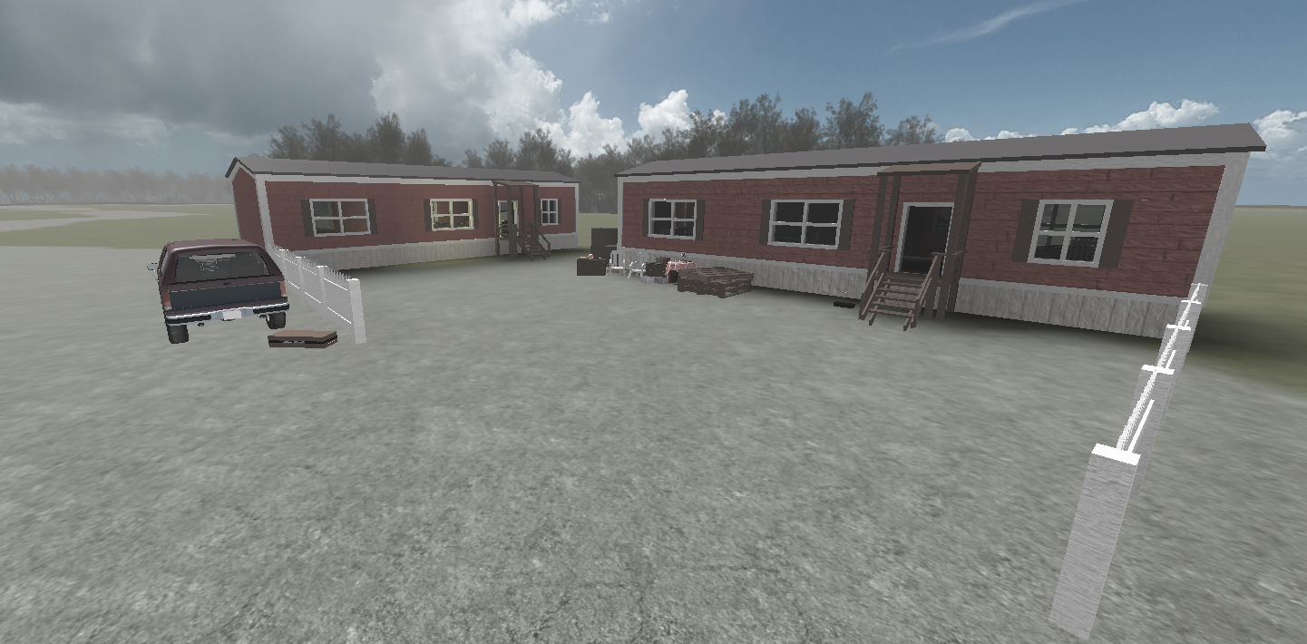 Rural residential property with multiple houses and open yard