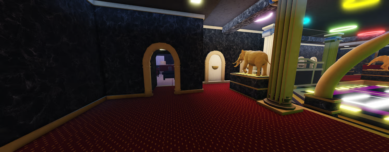 Golden elephant statues surrounding red club seating