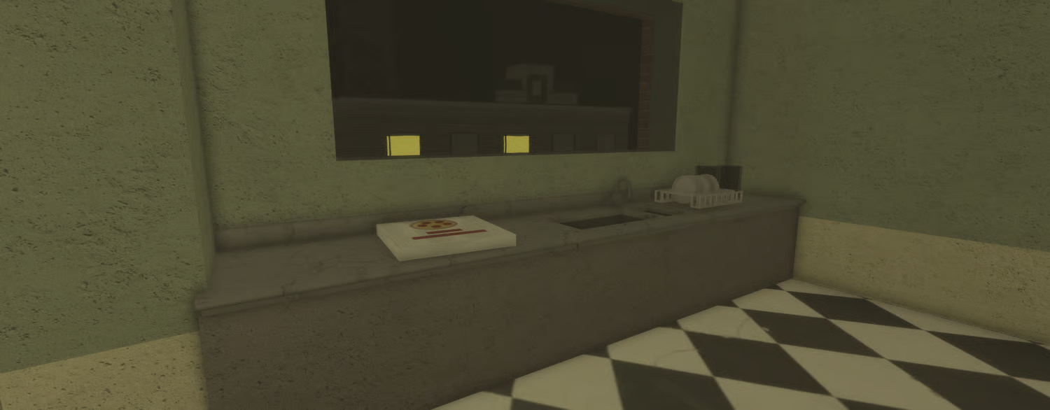 Kitchen sink counter with pizza box