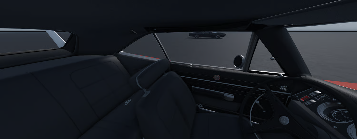 Open hood on orange classic muscle car