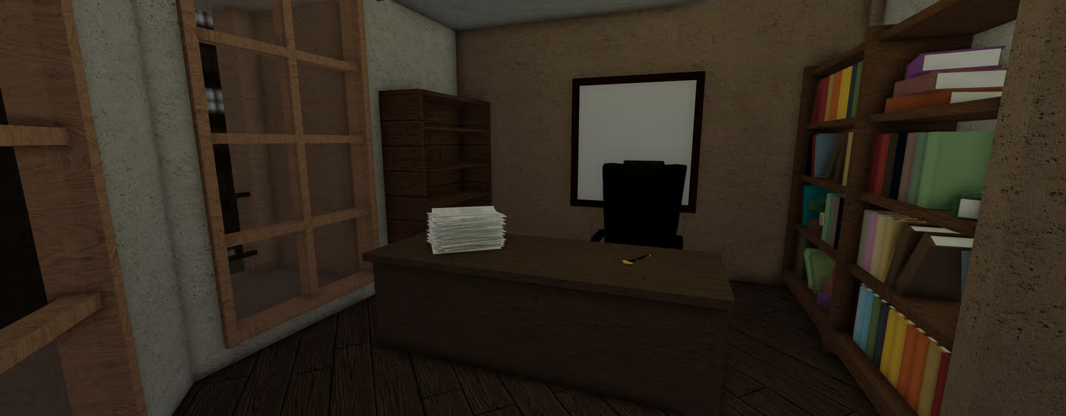Apartment office with desk and bookshelves