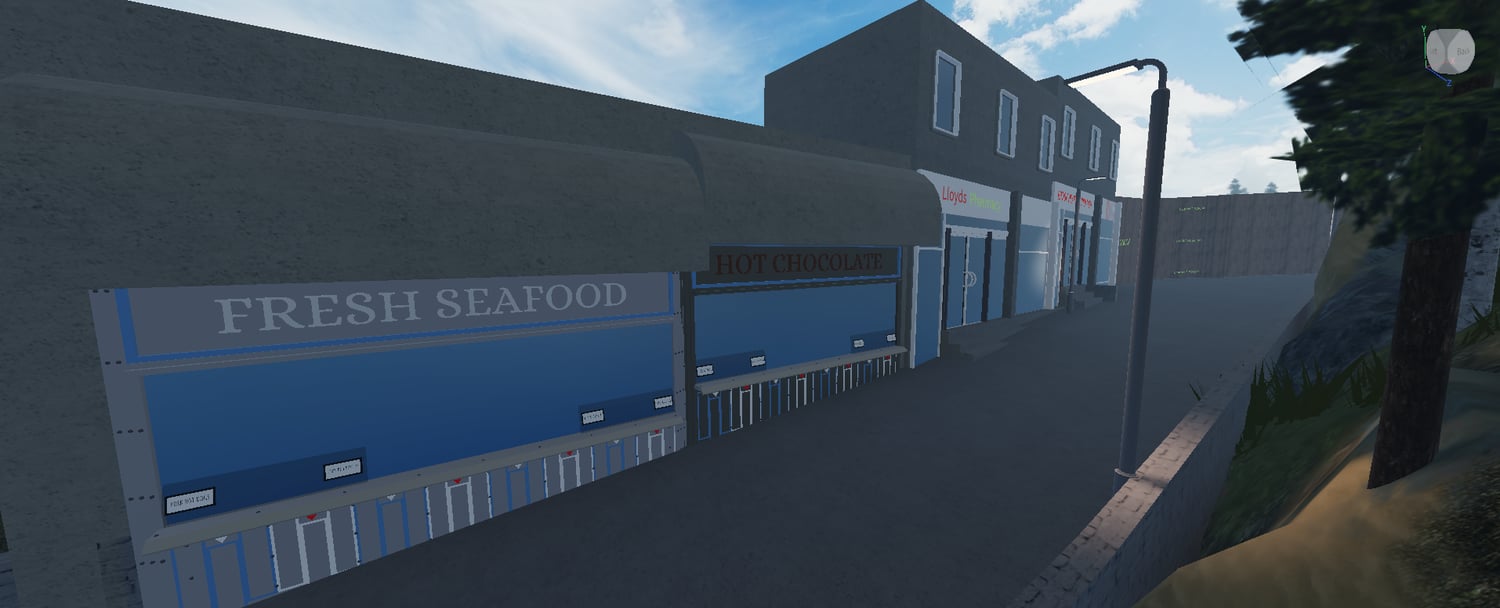 Coastal waterfront with surrounding hills