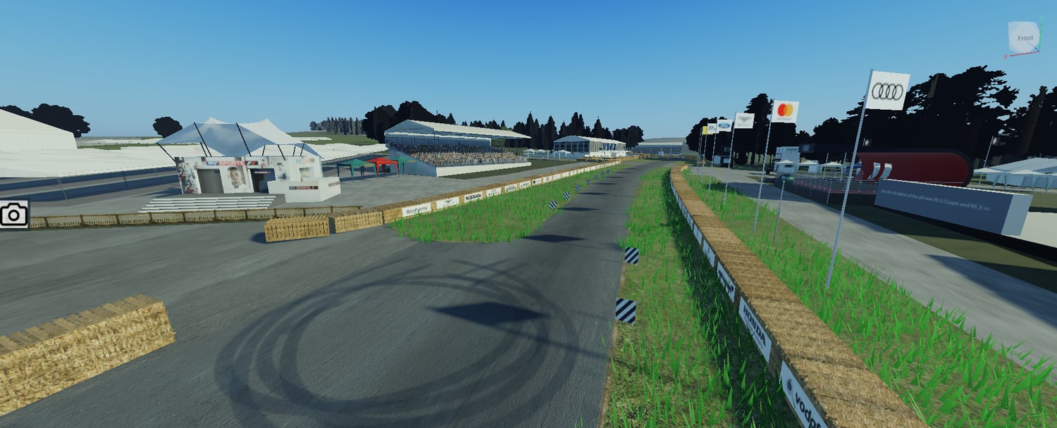 Goodwood-style hillclimb course surrounded by forest