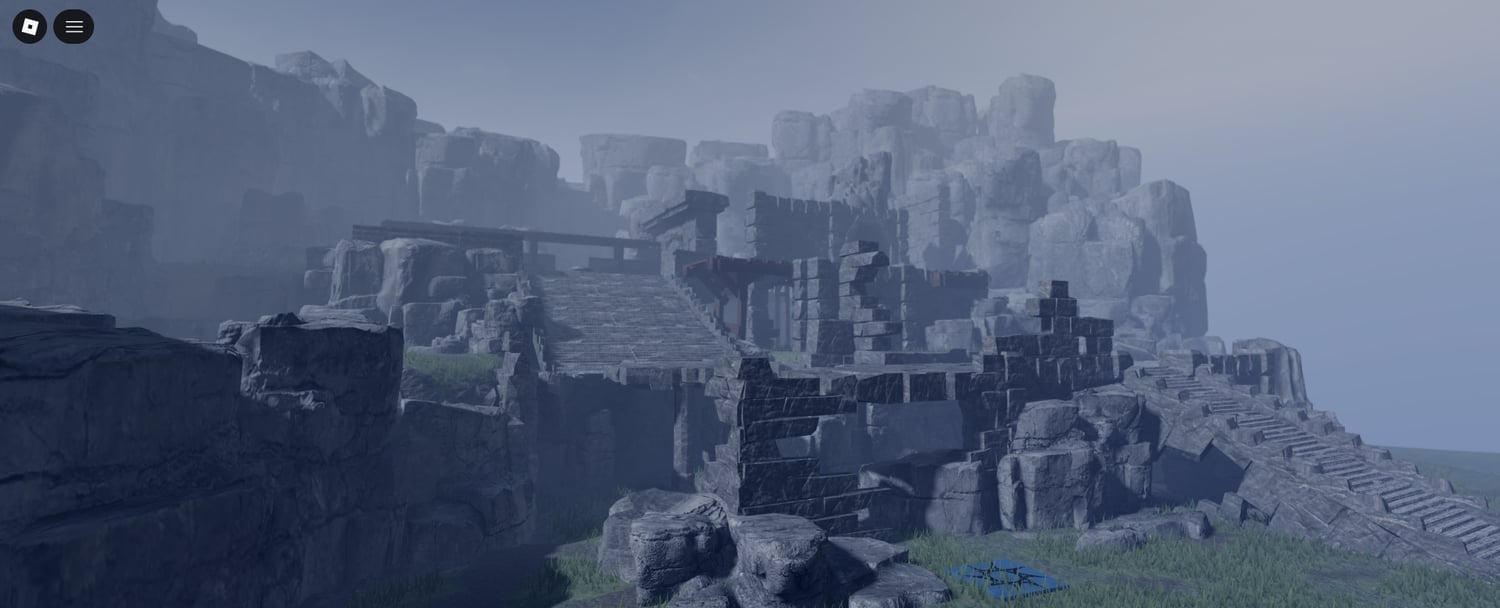 Rocky canyon environment with grassy terrain and futuristic structures