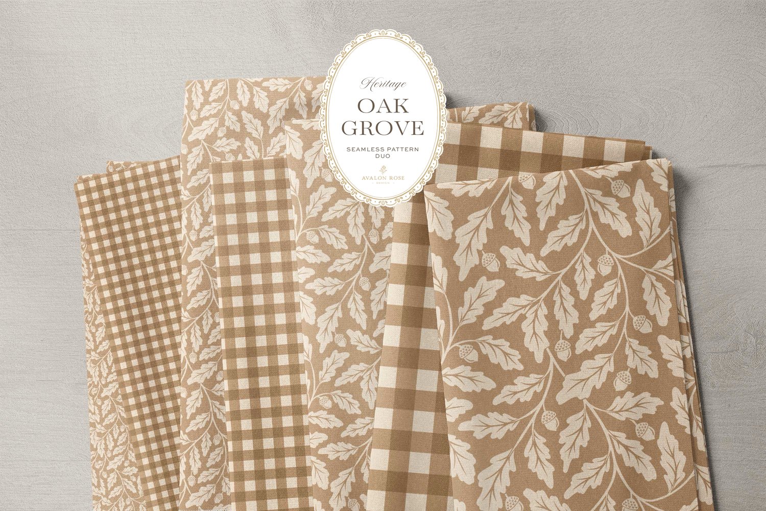 Oak Grove seamless surface pattern duo features hand drawn oak leaves and acorns in a flowing tonal design, paired with a coordinating gingham check in tan on bolts of fabric