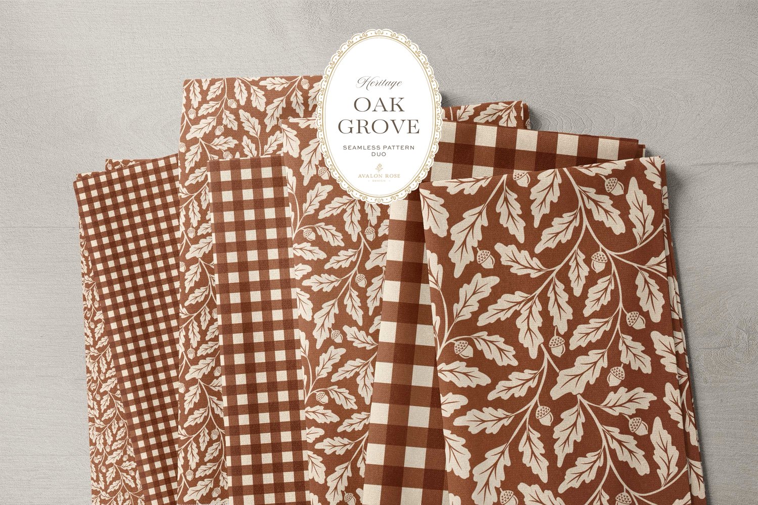 Oak Grove seamless surface pattern duo features hand drawn oak leaves and acorns in a flowing tonal design, paired with a coordinating gingham check in rust on bolts of fabric