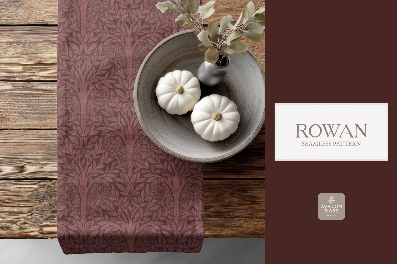 Hand drawn seamless pattern featuring woodland trees and leaves in red burgundy on a table runner next to a bowl of white pumpkins