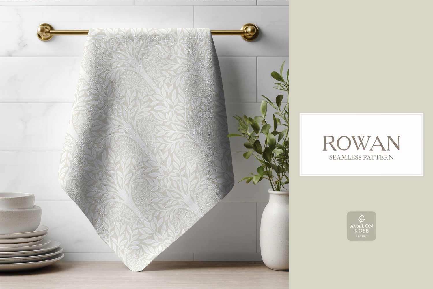 Hand drawn seamless pattern featuring woodland trees and leaves in cream and white on a tea towel hanging on a brass rod